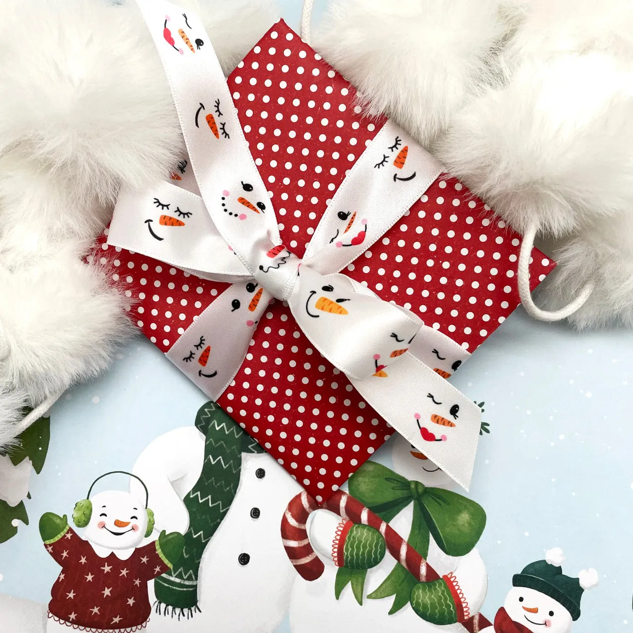Snowman ribbon snowman faces printed on 7/8" white satin